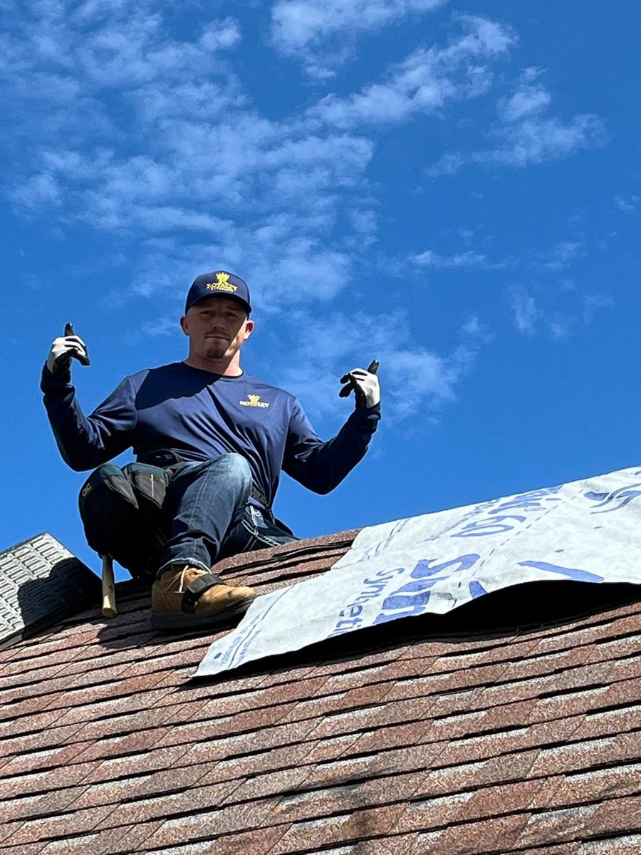 A Royalty Exteriors roofer on the job